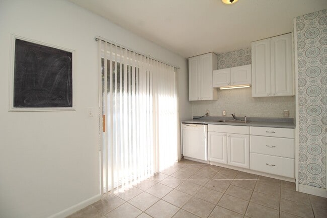Building Photo - Spacious 3BR/1.5BA Home in Pace with Open Living Area, Tiled Family Room, and Fenced Backyard – M...