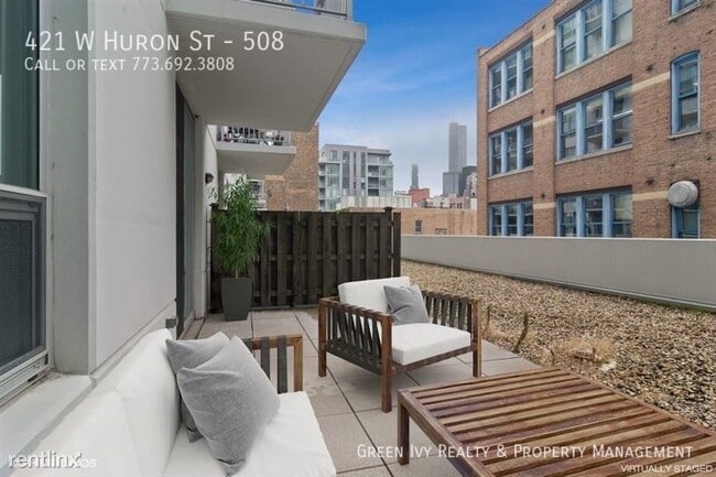 Building Photo - Stunning River North condo with Huge Patio!