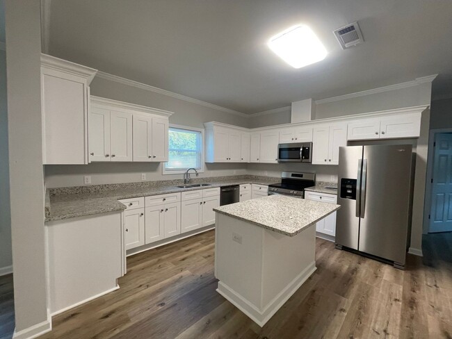 Building Photo - NEW CONSTRUCTION 4 BEDROOM PRE-LEASING FOR...