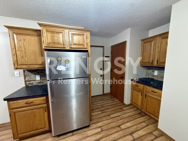 Building Photo - 6762 Gretchen Ct N