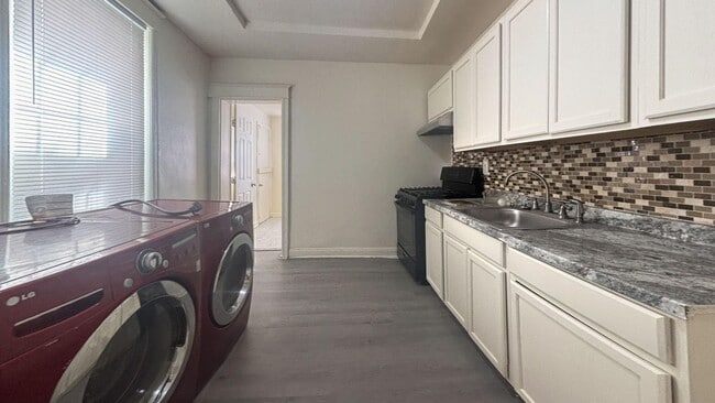 Building Photo - Modern 4-Bedroom Gem with Designer Finishes