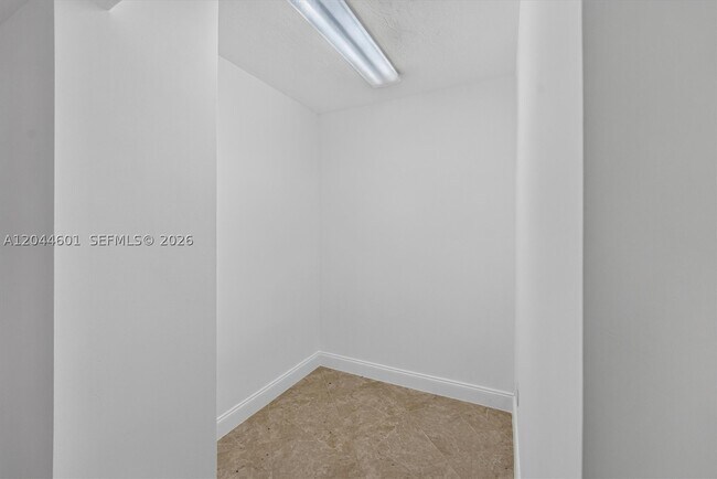 Building Photo - 5001 Collins Ave