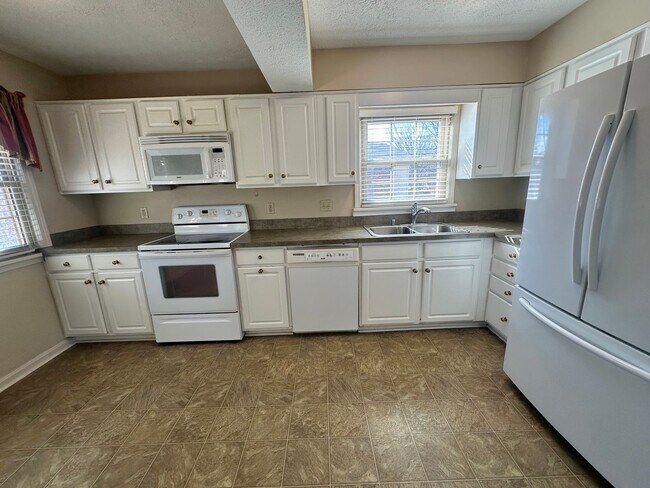 Building Photo - 3BR/3BA Home for Rent in J-town with Two Gar Garage and Large Deck!