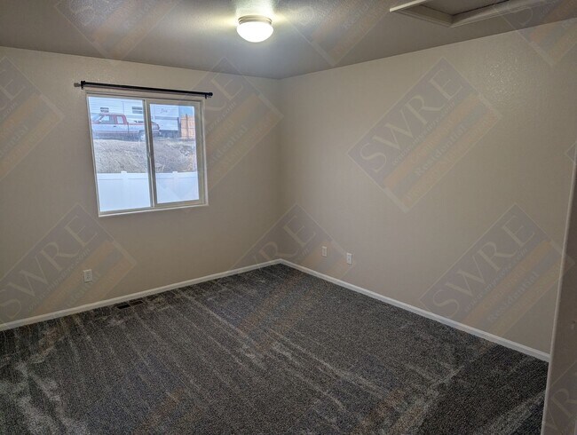 Building Photo - Available Now! Call 307.219.4881 to tour this property today!