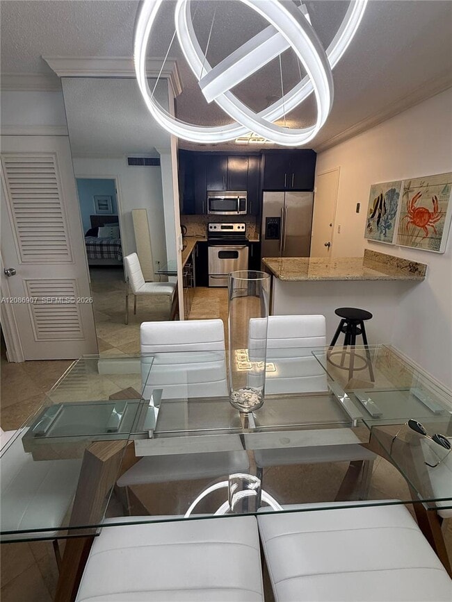 Building Photo - 5555 Collins Ave