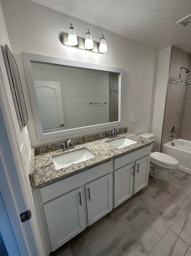Building Photo - 10936 SW Vasari Way