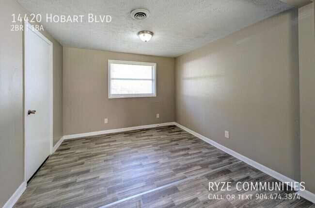 Building Photo - 14420 Hobart Blvd