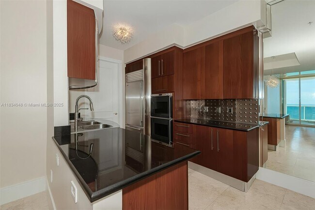 Building Photo - 18101 Collins Ave