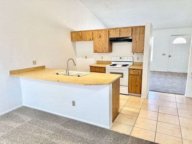 Building Photo - 2 Bedroom/2 Bath Home! Has Backyard, One Car Garage, NO HOA!