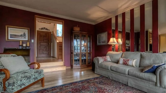 Building Photo - 4bd/3ba HUGE Home w/Hardwood Floors, Russian Fireplace, 2-Car Garage & Fenced Back Yard!