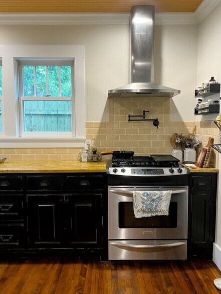 Stainless gas range and vent hood - 1003 Egan St