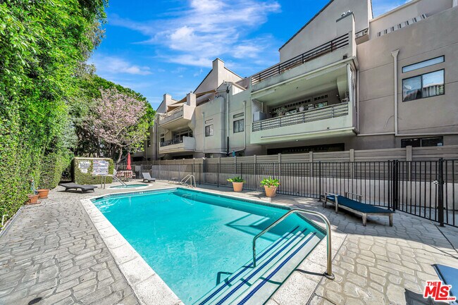 Building Photo - 4477 Woodman Ave