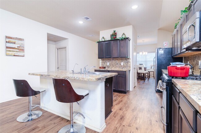 Building Photo - 24423 Raindrop Poppy Dr