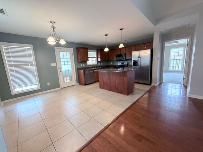 Building Photo - You've Found It! Split floor plan, fenced yard, extra storage