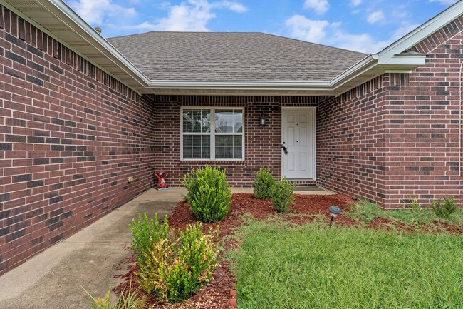 Building Photo - Charming 3-Bedroom Home with Fireplace & A...