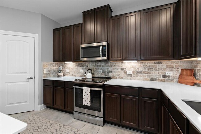 Building Photo - 7813 Peccary Dr