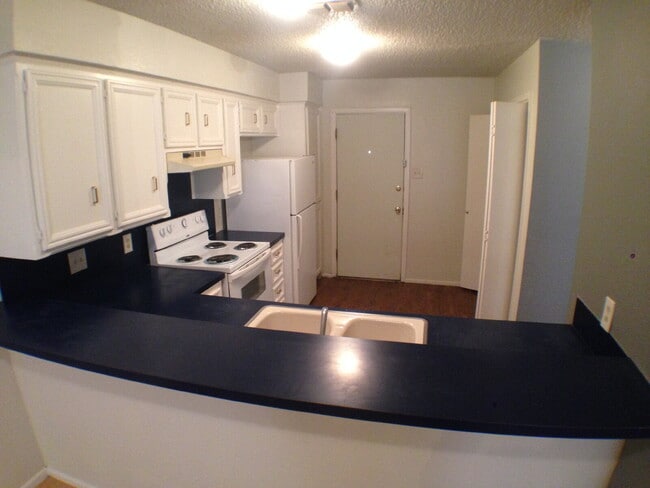 Building Photo - Two Story Condo In Whisperwood Located Near Loop 289 & Minutes From Tech & LCU Campus!