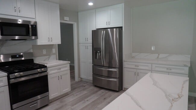 Building Photo - Beautiful Remodeled Single Story 4 BR 2 BA Home With 3 Car attached Garage