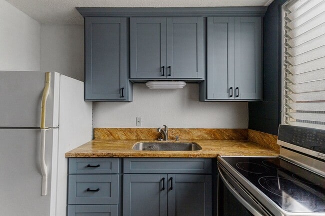 Building Photo - Discover this pet-friendly 2-bedroom condo