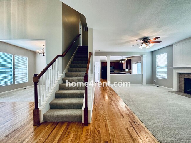 Building Photo - Wood Floors, Open Layout, Plenty of Natura...