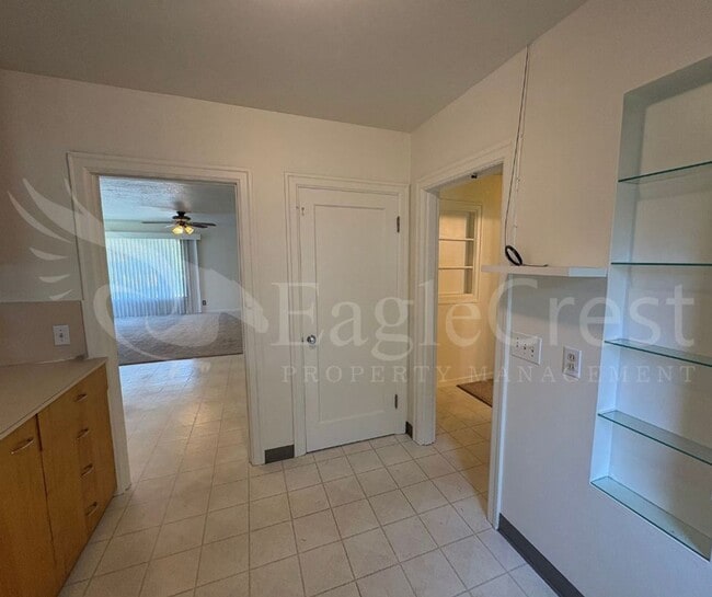 Building Photo - Three Bedroom, Two Bathroom House with Fenced Yard and Outdoor Fireplace