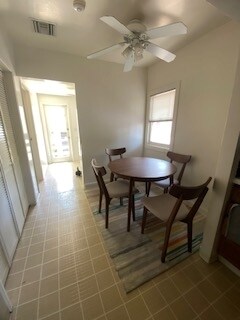 10.3 Breakfast Nook- looking out back door; Right-laundry room; Left- Half bath - 680 Highland St