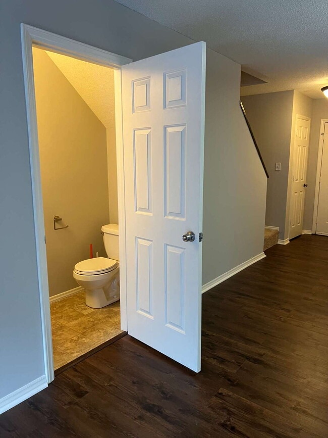 Building Photo - Charming 3 bedroom 2 bath townhome with lots of light and open downstairs. Galley kitchen, lots o...