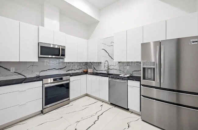 Building Photo - 6982 W 22nd Ave