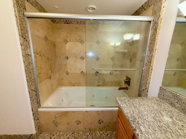 Building Photo - Riverwalk Tower 2 Bedroom Condo - 2 Parking Spaces/Private Laundry