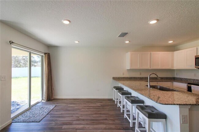 Building Photo - 10276 N Spaulding Dr