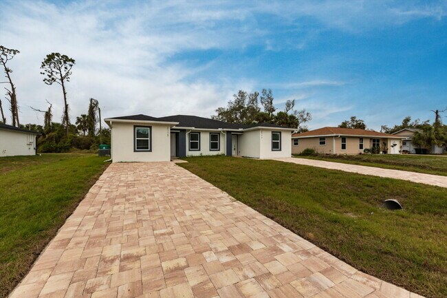 Building Photo - BRAND NEW Construction, 3 bed / 2 bath Rent-Ready Home in Port Charlotte!