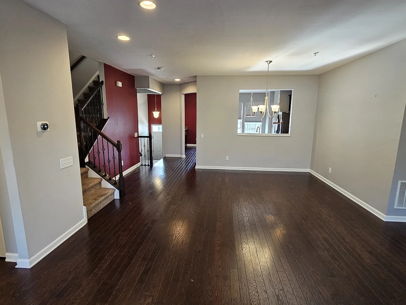 Spacious open-concept main living level offers versatile dining, lounging, and entertaining layouts - 1736 Beacon Ln