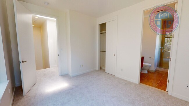 Building Photo - Riverfront Location, Luxury Townhome - End Corner Unit, Two En-Suites, Attached Garage