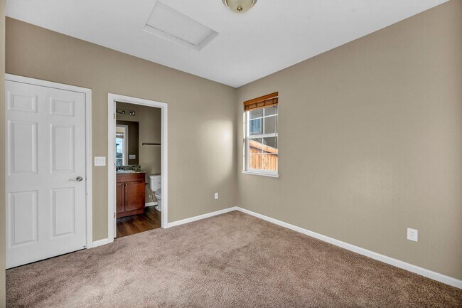 Building Photo - Sun-Filled, Spacious Living with a Three-Car Garage