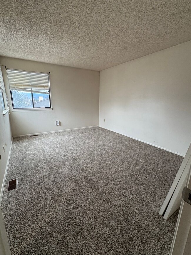 Building Photo - 2 Bedroom with a Wood Burning Stove