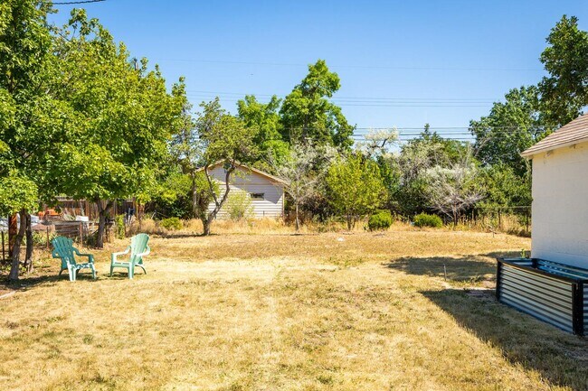 Building Photo - Updated and Bright Home with Yard