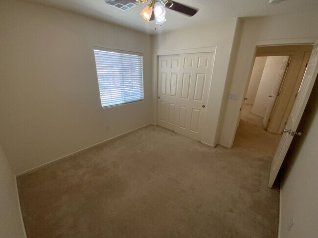 Building Photo - 4 bedrooms and 2.5 bathrooms 2-story home located in Henderson, NV!