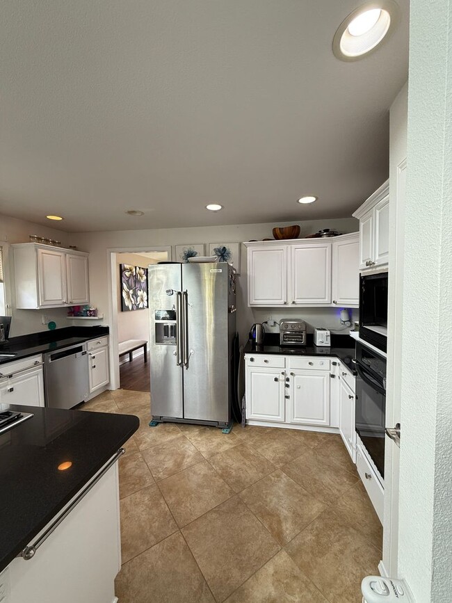 Building Photo - Live at Steamboat Landing – Luxury Riverfr...