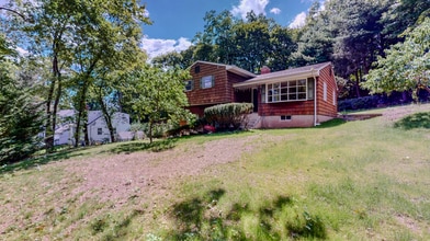 Building Photo - Spacious 3-Bedroom Split-Level with Firepl...