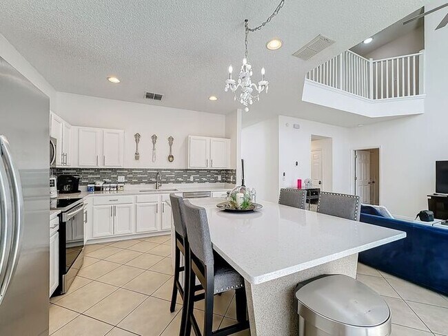 Building Photo - STUNNING Emerald Island Resort 5 bedroom 4.5 bath Luxury Home FULLY FURNISHED! 3 miles from Disney!