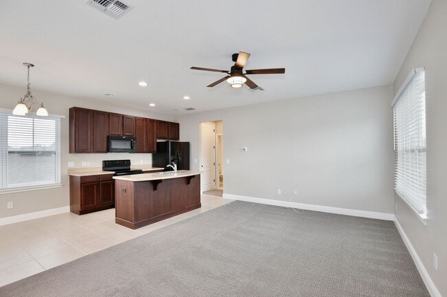 Building Photo - *Unfurnished* Beautiful 1/1 Spacious Garage Apartment in the Exclusive Laureate Park - Orlando!