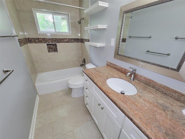 Building Photo - 3 Bed Home for Rent in Westbury 77035 with Large Fenced Yard & Deck