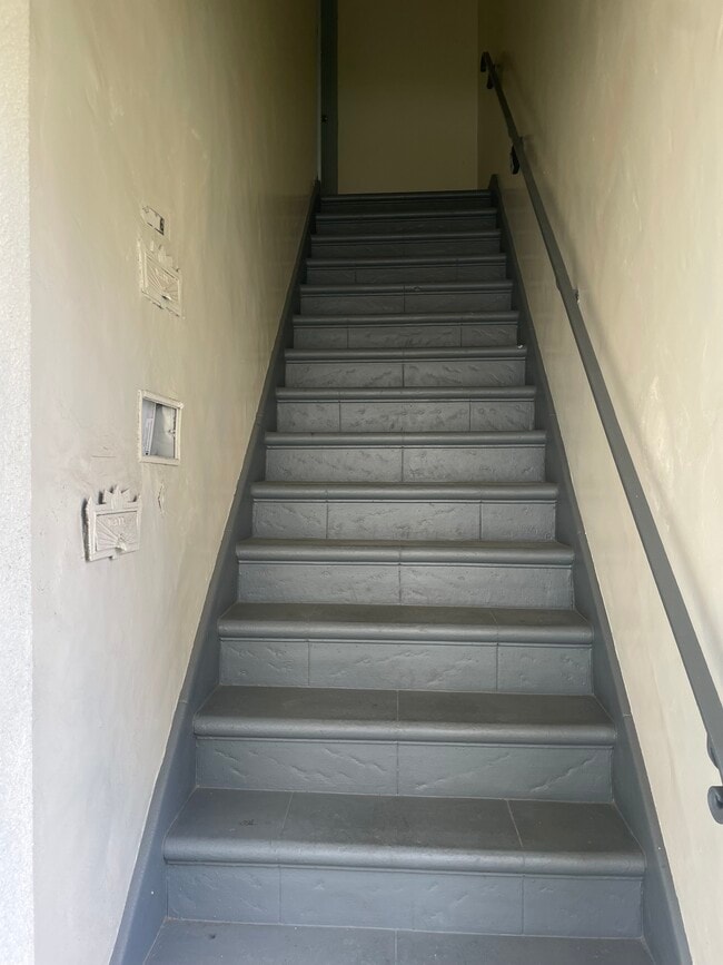 stairs to unit - 5906 San Vicente Blvd