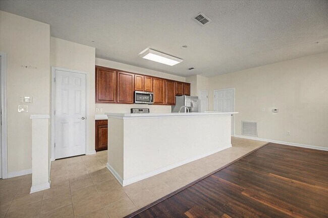 Building Photo - Peaceful Pond Views + Open Layout | 2BR + Office in Prime Location