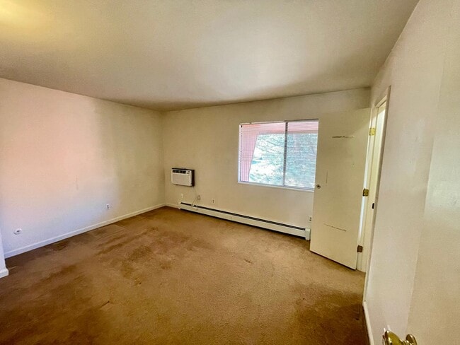 Building Photo - Beautiful Two-story, 3 Bed, 1.5 Bath Condo 1/2 Mile from CSU!