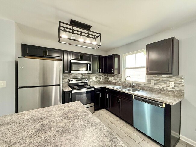 Building Photo - Charming 3BD, 1.5BA Clayton Home Near Shopping and Dining with Modern Updates