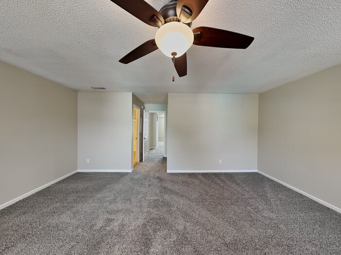 Building Photo - 9207 Wandflower Dr