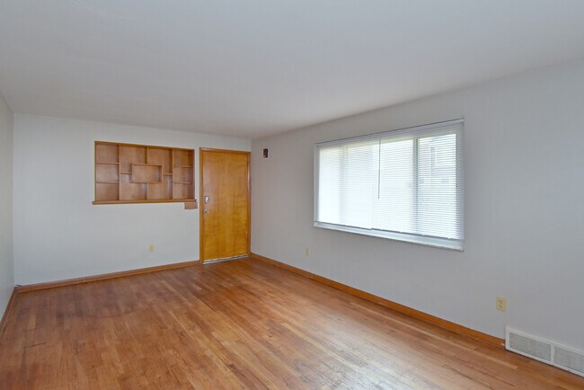 Living Area with built-in display shelved - 3101 Clermont Ave