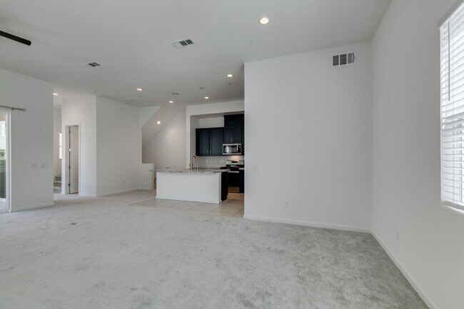 Building Photo - Stunning 4-Level Townhome in Inspirada | R...