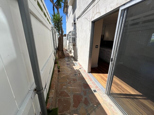 Building Photo - TWO PARKING SPACES INCLUDED! In Unit Washer & Dryer! Large Private Patio for Bikes, Boards and Bb...